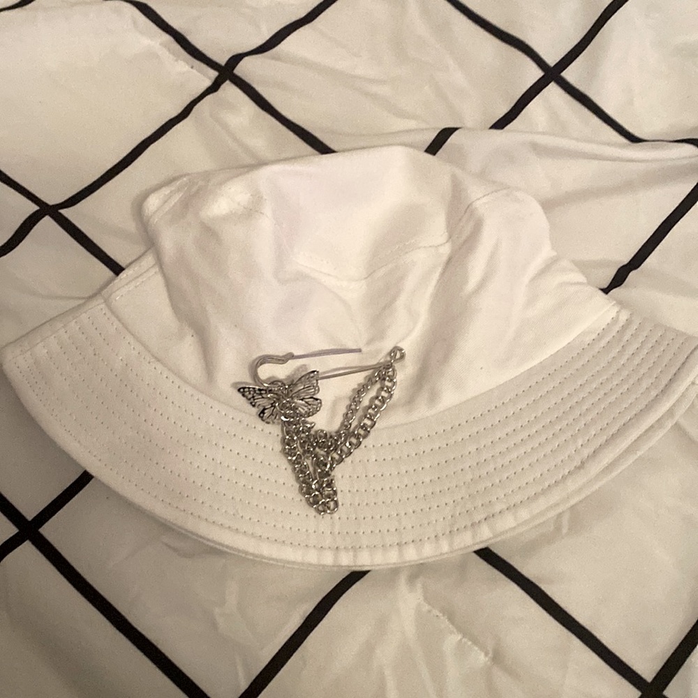 bucket hat with  butterfly pin